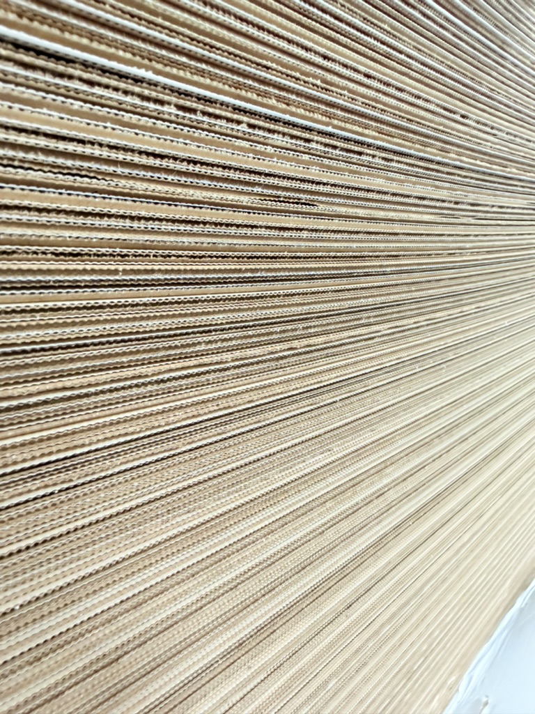 Stacked corrugated sheet stock